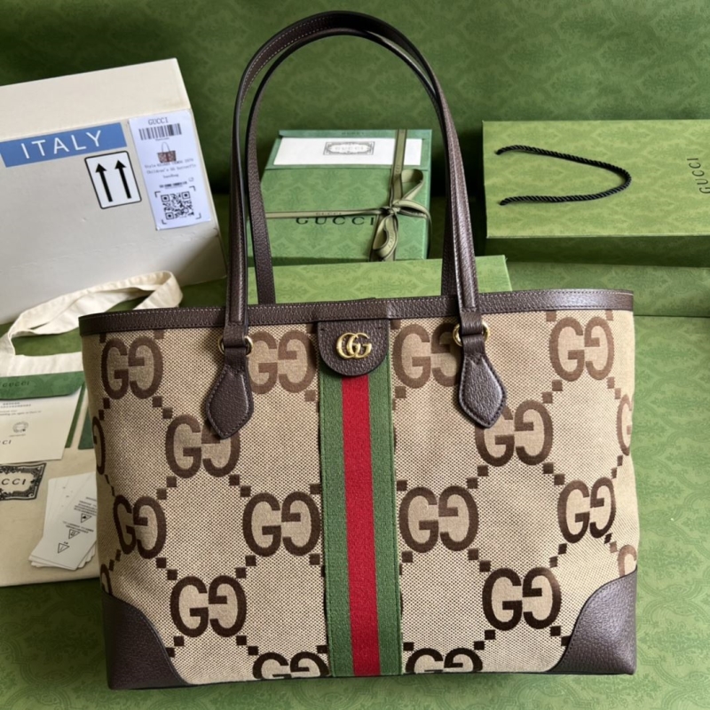 G*u*i shopping bags